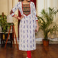 Graceful Ikat Cotton Straight Cut Kurta with Hand made Kutch Mirror work on Yoke and Sleeves