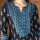 Exclusive black ikat kurta with embroidered yoke.