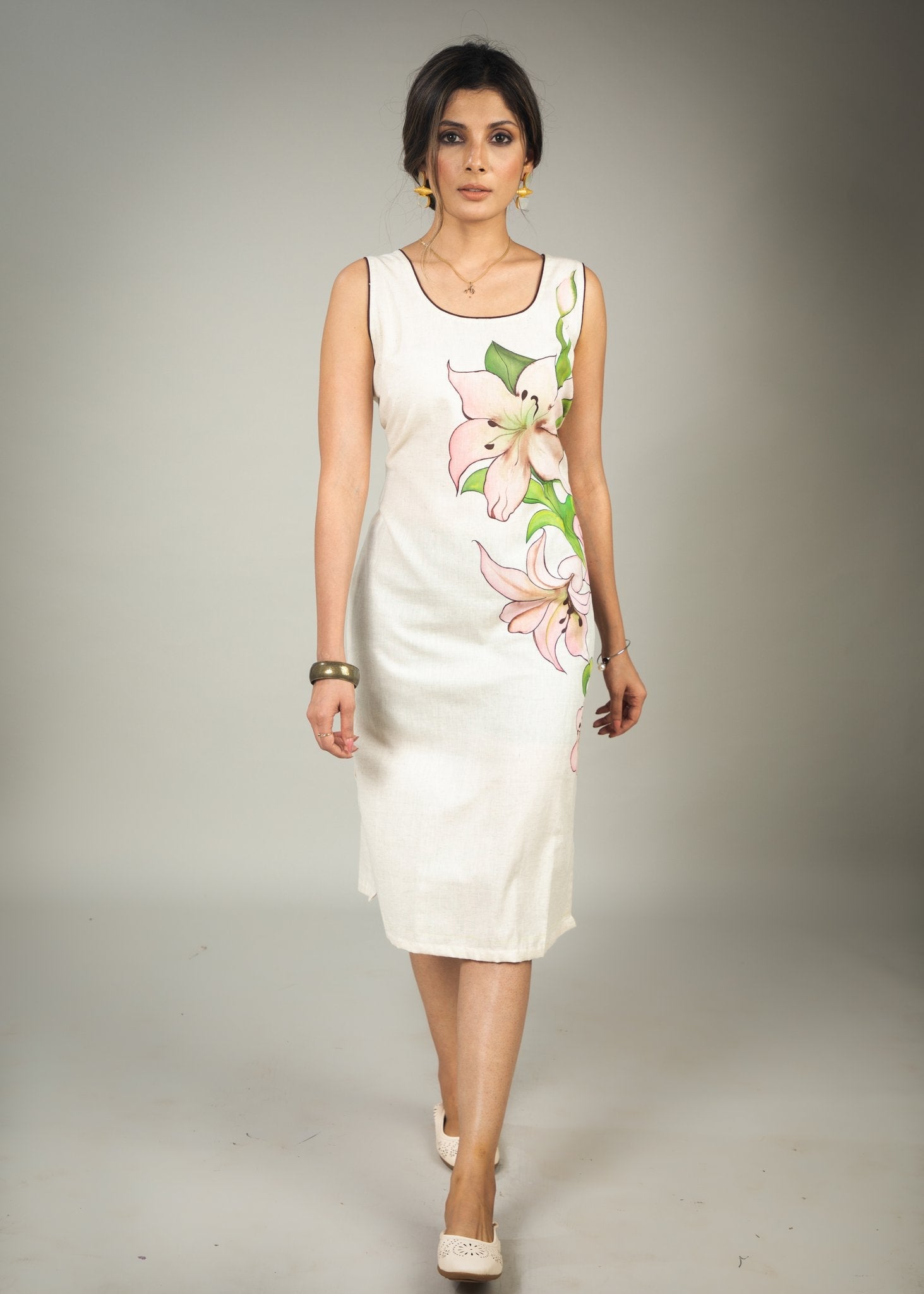 Hand painted cotton dress with floral motifs