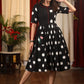 Authentic double ikat polka dotted dress with embroidered motif on pocket