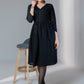 Black embroidered elbow sleeves dress with gold buttons